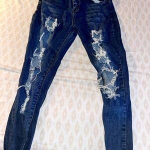 Blue Skinny Jeans with Distressed Detailing